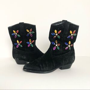 J Bar J black suede cowgirl boots with floral rhinestones on the shaft.